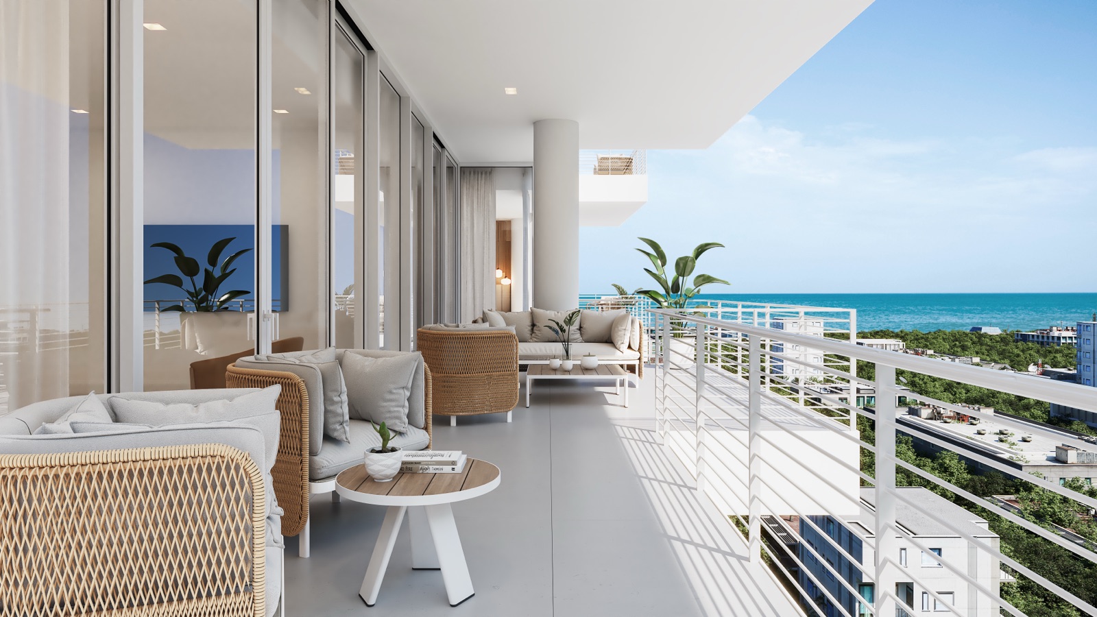A deep wrap-around private terrace at The Terraces Fort Lauderdale Beach — natural woven lounge furniture, glass railings, and uninterrupted views of the Atlantic Ocean beyond the tree-lined enclave of North Beach Village.